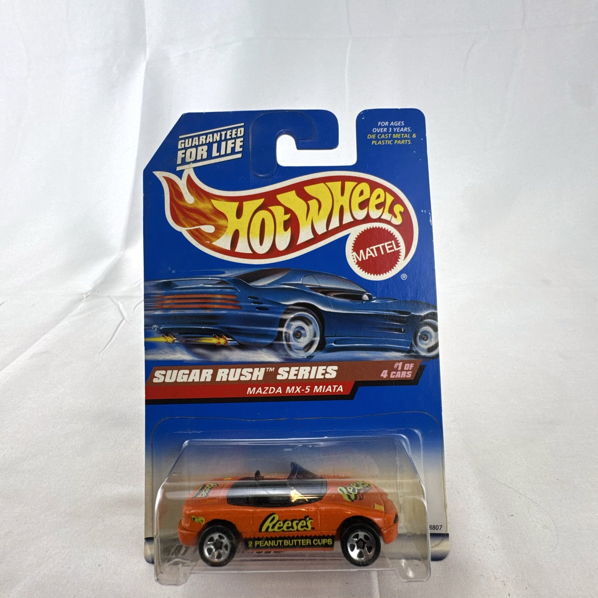 Hot Wheels 1998 Mazda MX-5 Miata Sugar Rush Reese's diecast car sealed on card