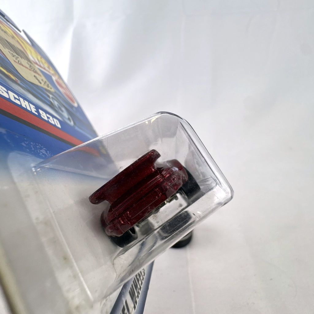 Hot Wheels 1:64 metallic red Porsche 930 Slant Nose diecast car with Zero G graphics