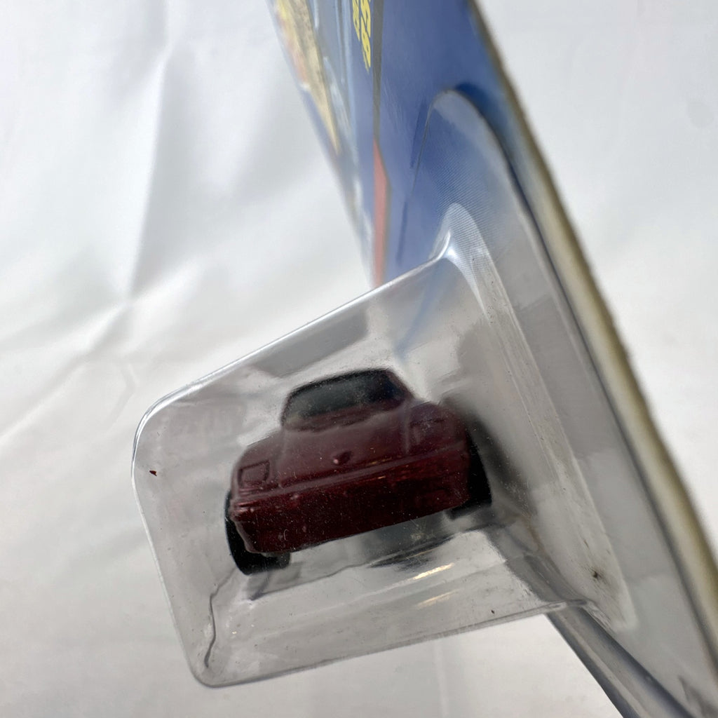 Hot Wheels 1:64 metallic red Porsche 930 Slant Nose diecast car with Zero G graphics