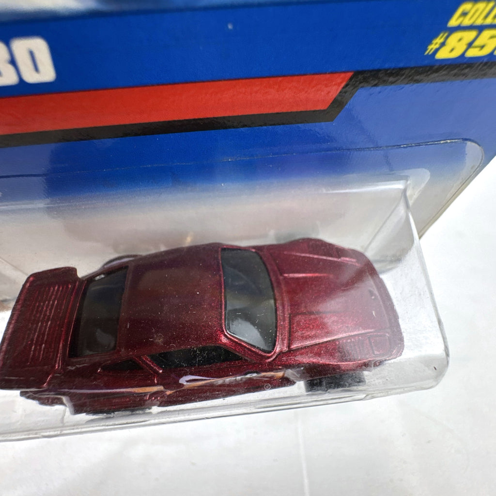 Hot Wheels 1:64 metallic red Porsche 930 Slant Nose diecast car with Zero G graphics