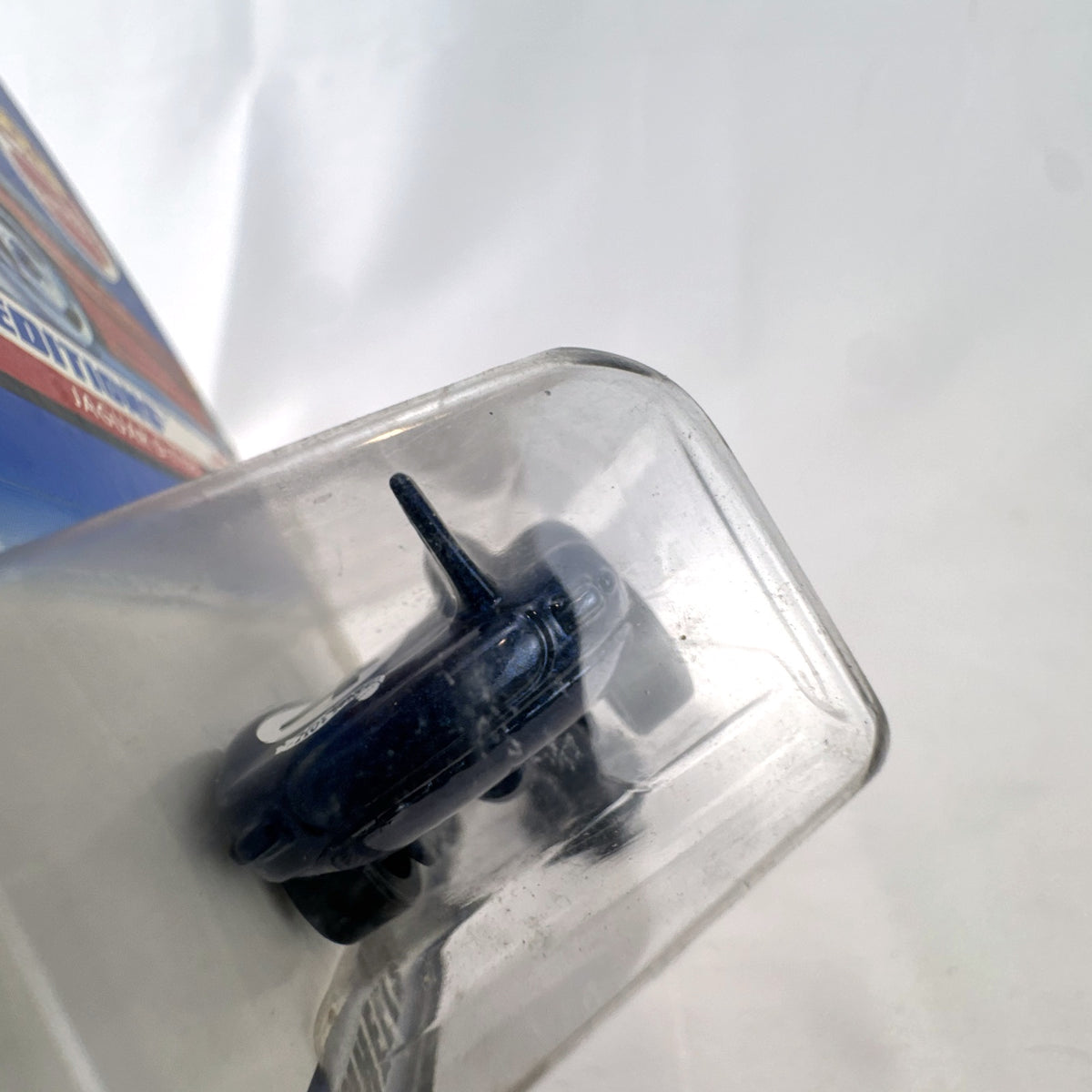 Hot Wheels 1998 First Editions Jaguar D-Type 1:64 diecast car in dark metallic blue factory sealed packaging