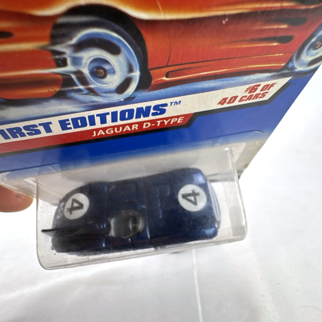 Hot Wheels 1998 First Editions Jaguar D-Type 1:64 diecast car in dark metallic blue factory sealed packaging