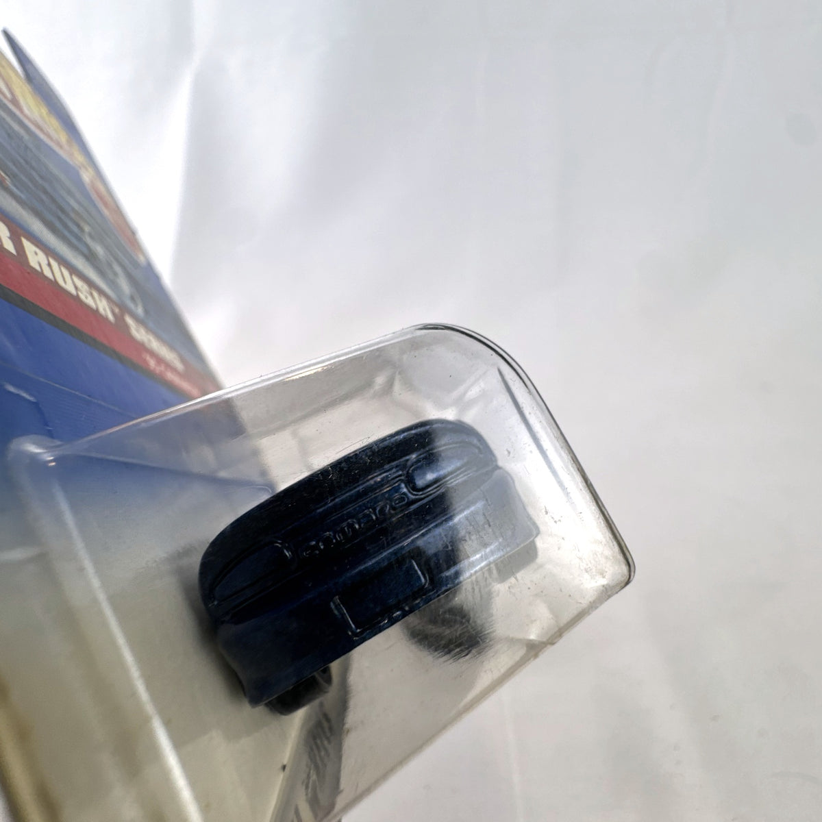 Hot Wheels 1995 Chevrolet Camaro Convertible in dark metallic blue with Nestle Crunch graphics on original card