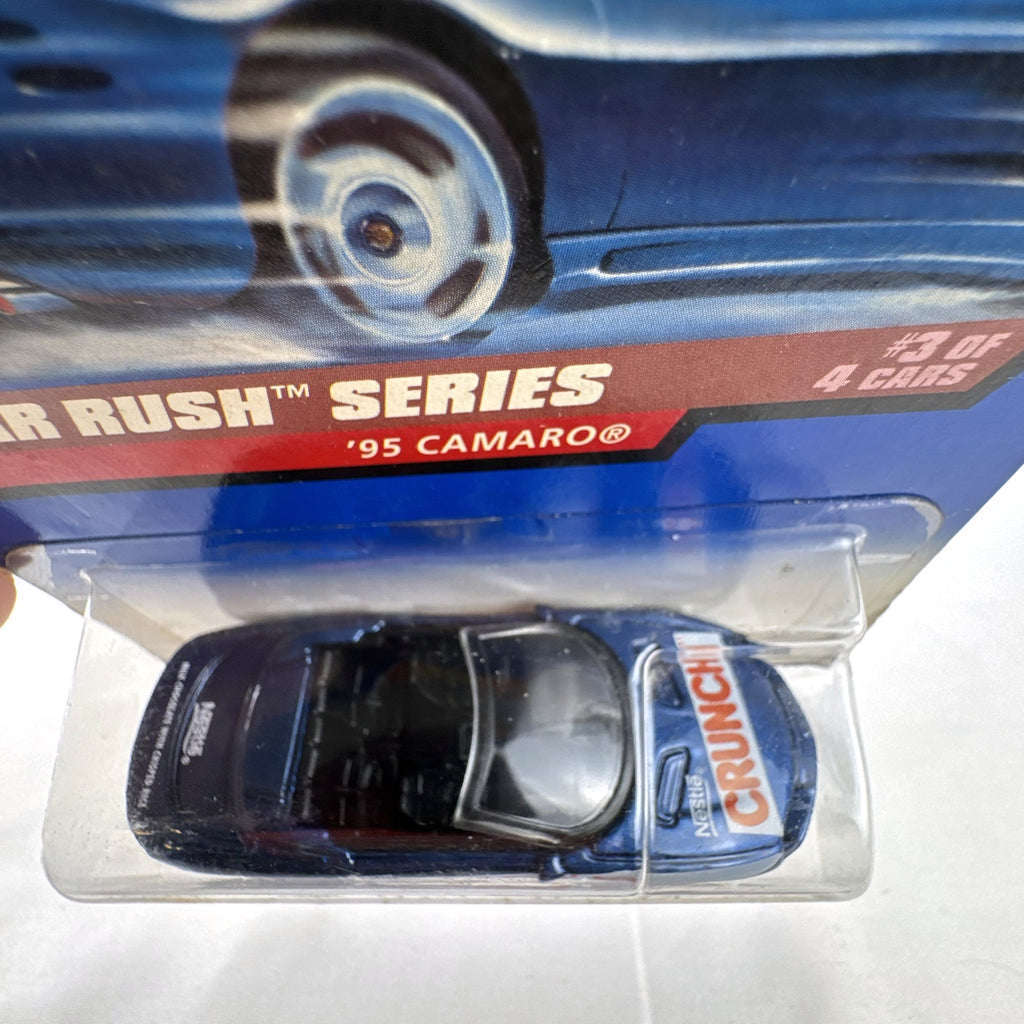 Hot Wheels 1995 Chevrolet Camaro Convertible in dark metallic blue with Nestle Crunch graphics on original card