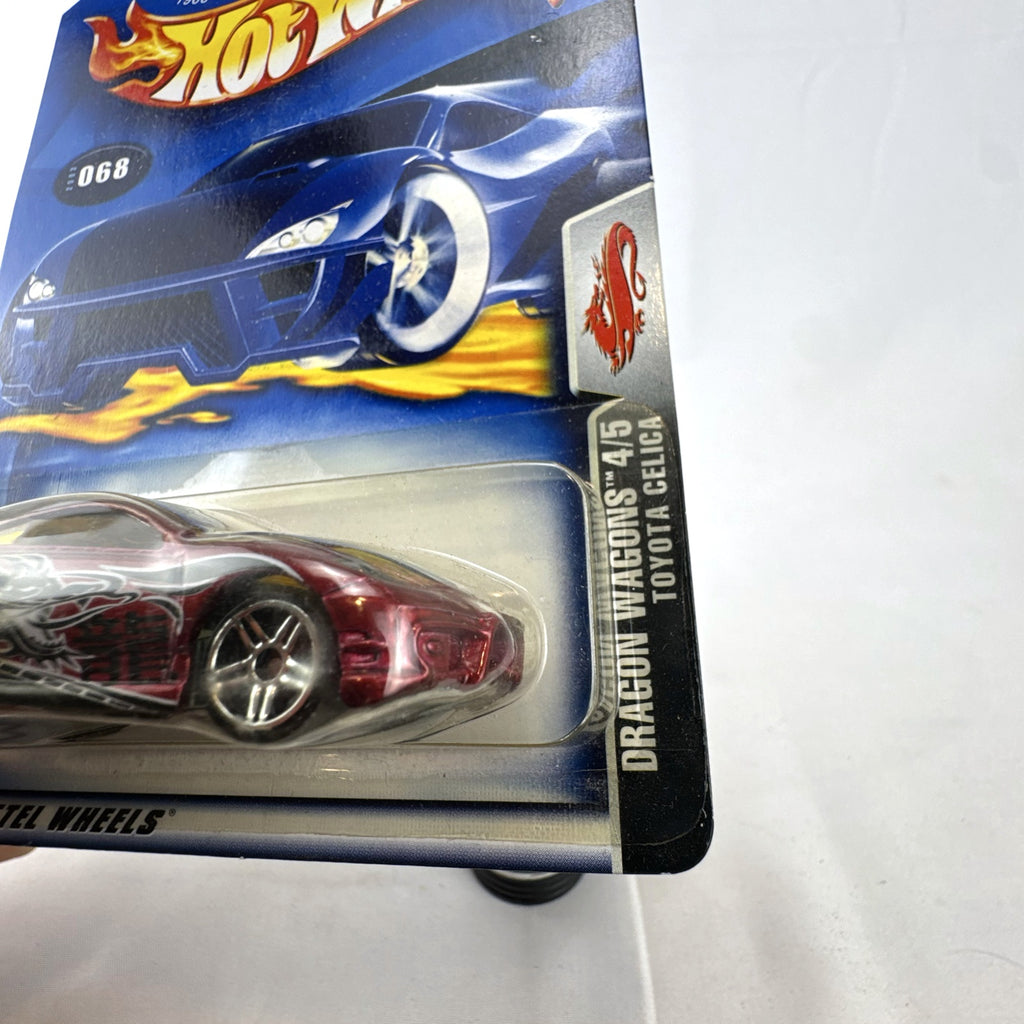 2003 Hot Wheels Toyota Celica Dragon Wagons diecast car in metallic red sealed on card