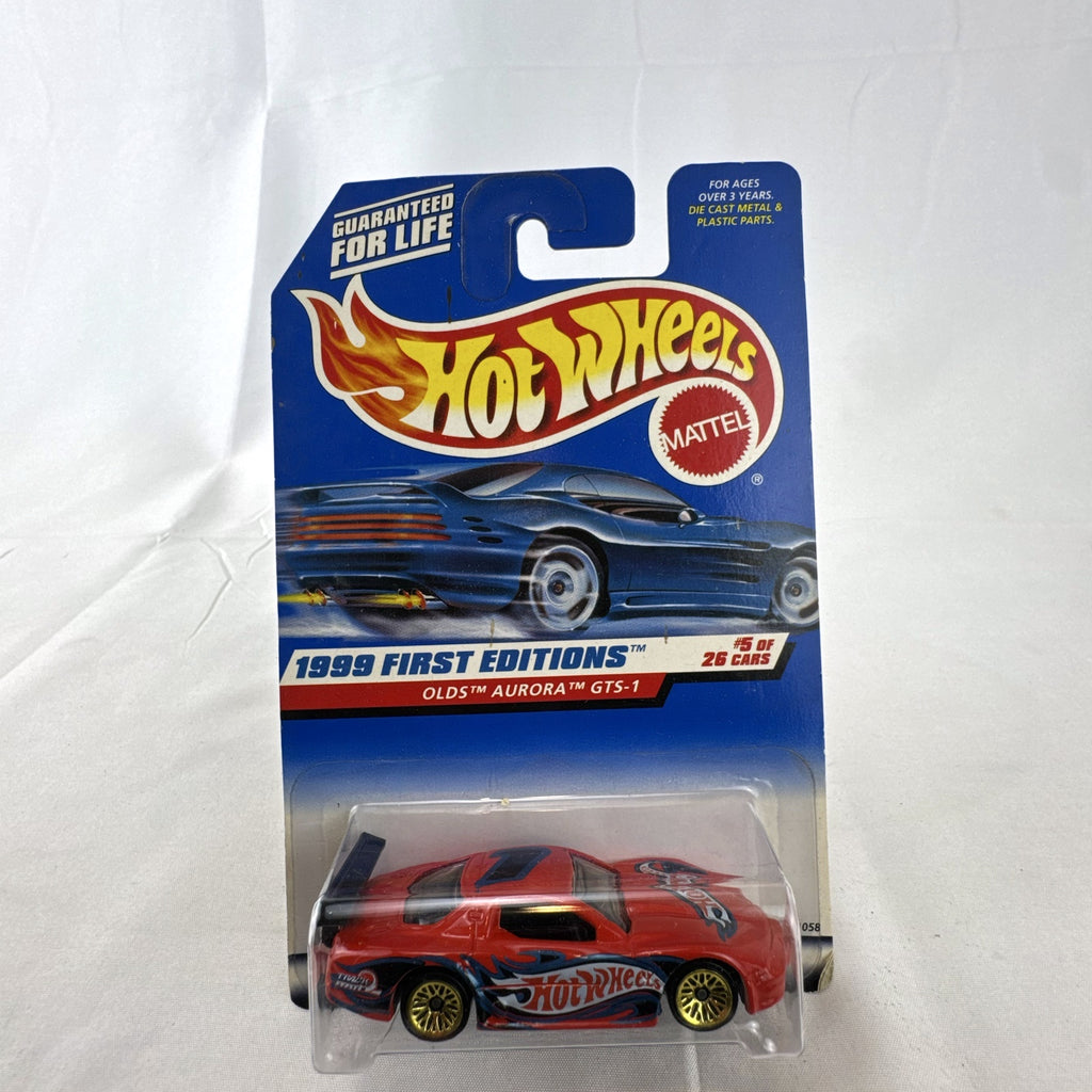 1999 Hot Wheels First Editions Oldsmobile Aurora GTS-1 red diecast race car factory sealed on card