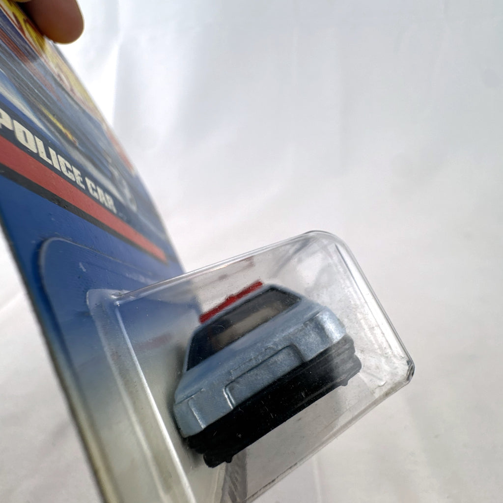 Hot Wheels 1:64 scale silver State Police K9 Unit cruiser diecast car sealed on original card packaging