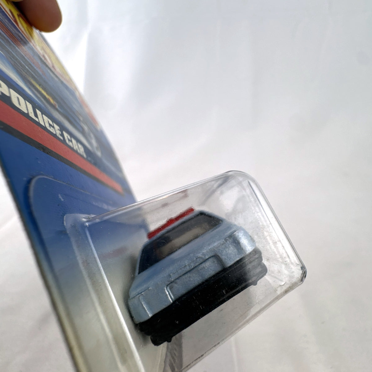 Hot Wheels 1:64 scale silver State Police K9 Unit cruiser diecast car sealed on original card packaging