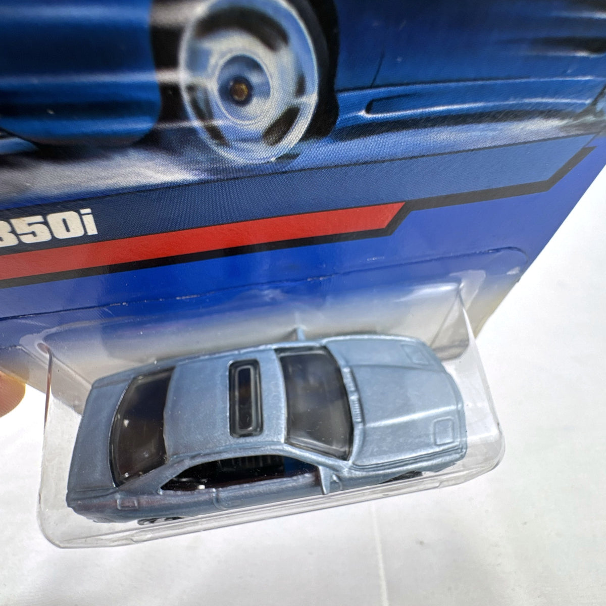 Hot Wheels BMW 850i diecast coupe in metallic light blue sealed on original blister card