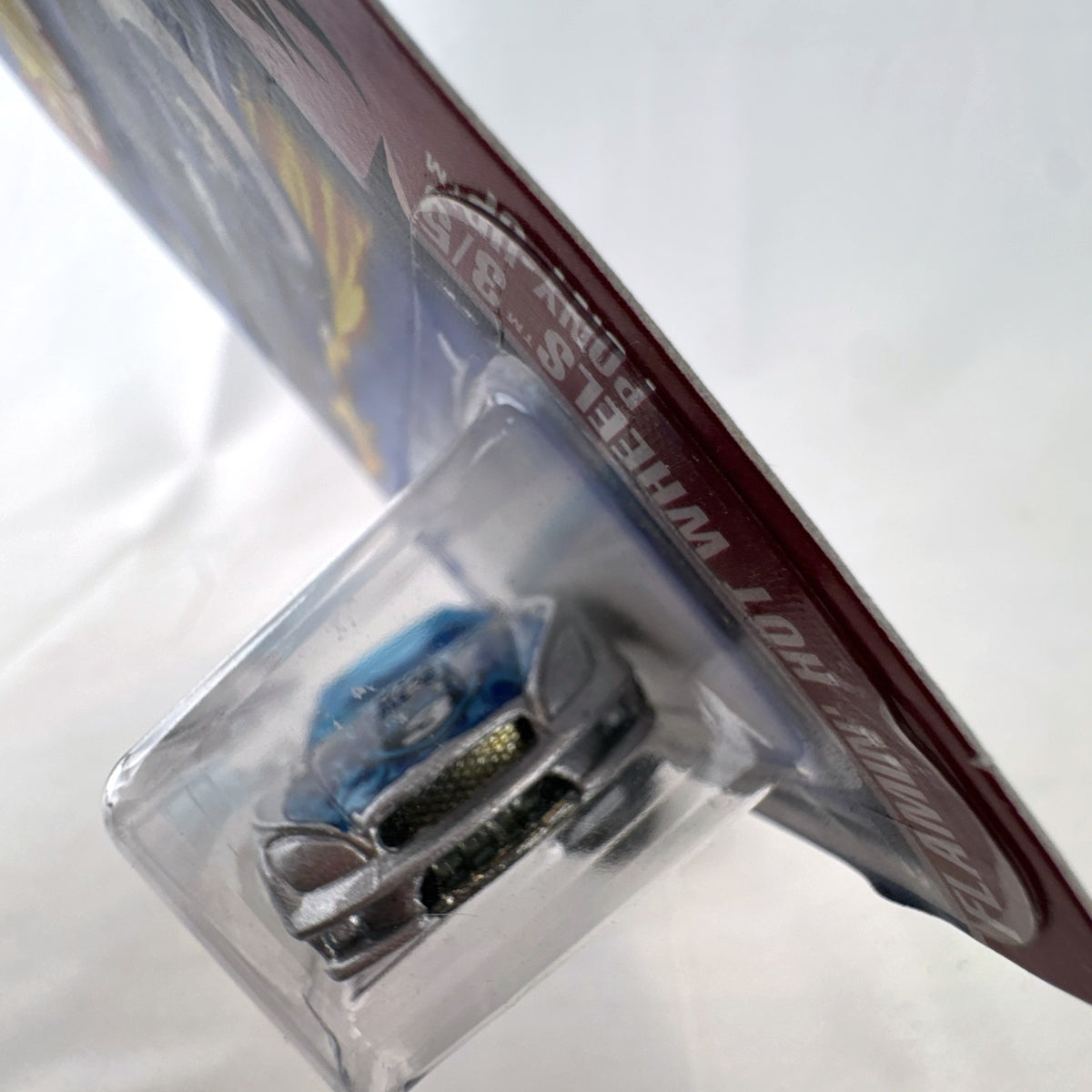 Hot Wheels 2003 Flamin' Hot Wheels Pony-Up 1:64 diecast car in silver with blue flames, factory sealed on blister card.
