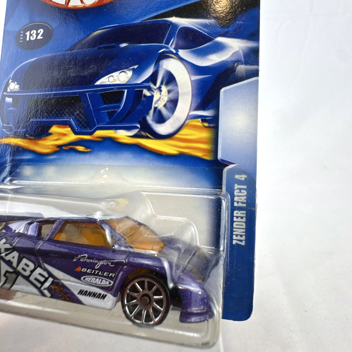 Hot Wheels 2003 35th Anniversary Zender Fact 4 concept car in metallic purple, sealed on original card.