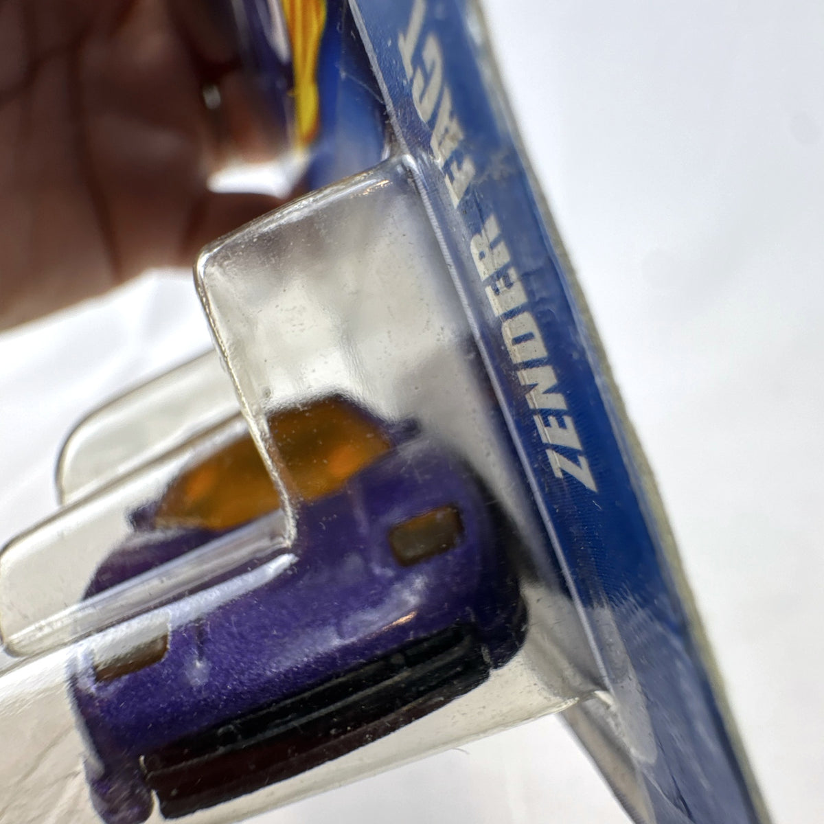 Hot Wheels 35th Anniversary Zender Fact 4 diecast car in metallic purple, sealed in original blister pack