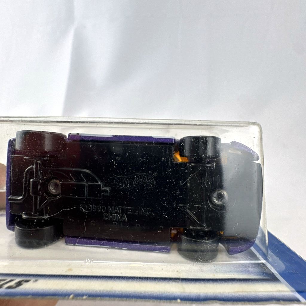 Hot Wheels 2003 35th Anniversary Zender Fact 4 concept car in metallic purple, sealed on original card.
