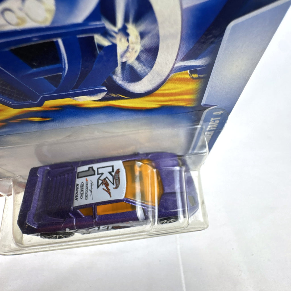 Hot Wheels 2003 35th Anniversary Zender Fact 4 concept car in metallic purple, sealed on original card.