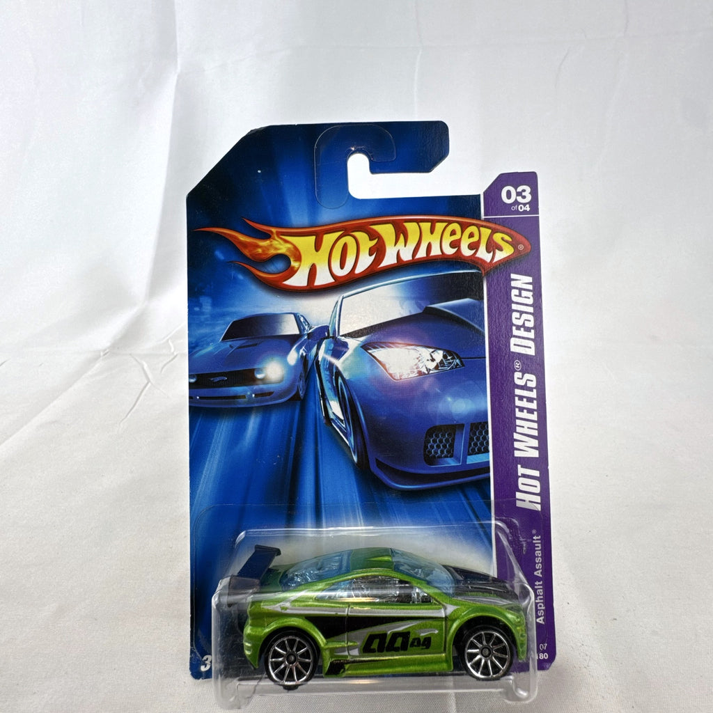Hot Wheels Asphalt Assault 1:64 diecast car in metallic green sealed on original short card packaging.