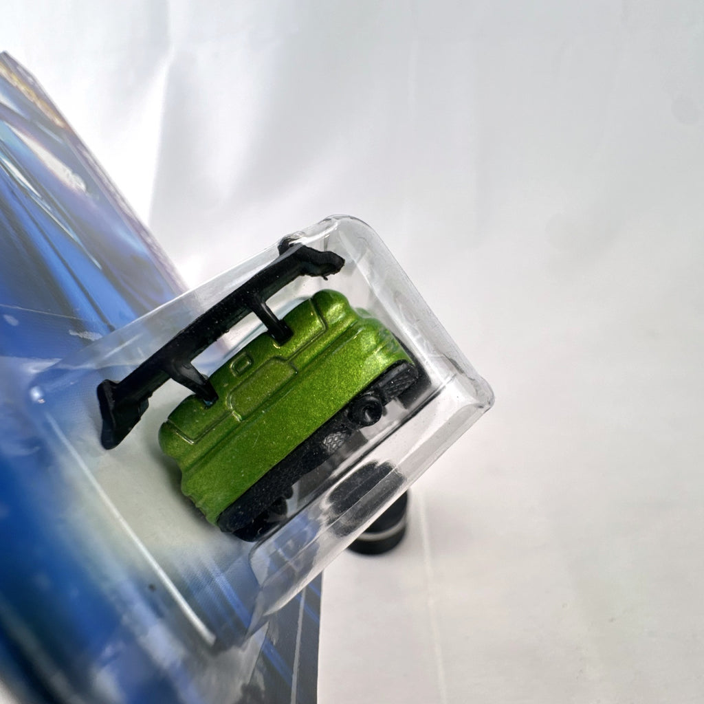 Hot Wheels Asphalt Assault 1:64 diecast car in metallic green sealed on original short card packaging.