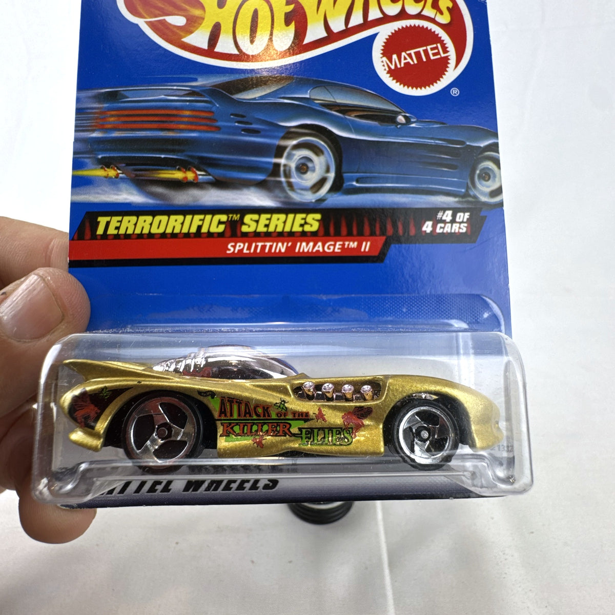 Hot Wheels 1:64 scale Splittin' Image II diecast car in metallic gold sealed on original Terrorific Series blister card