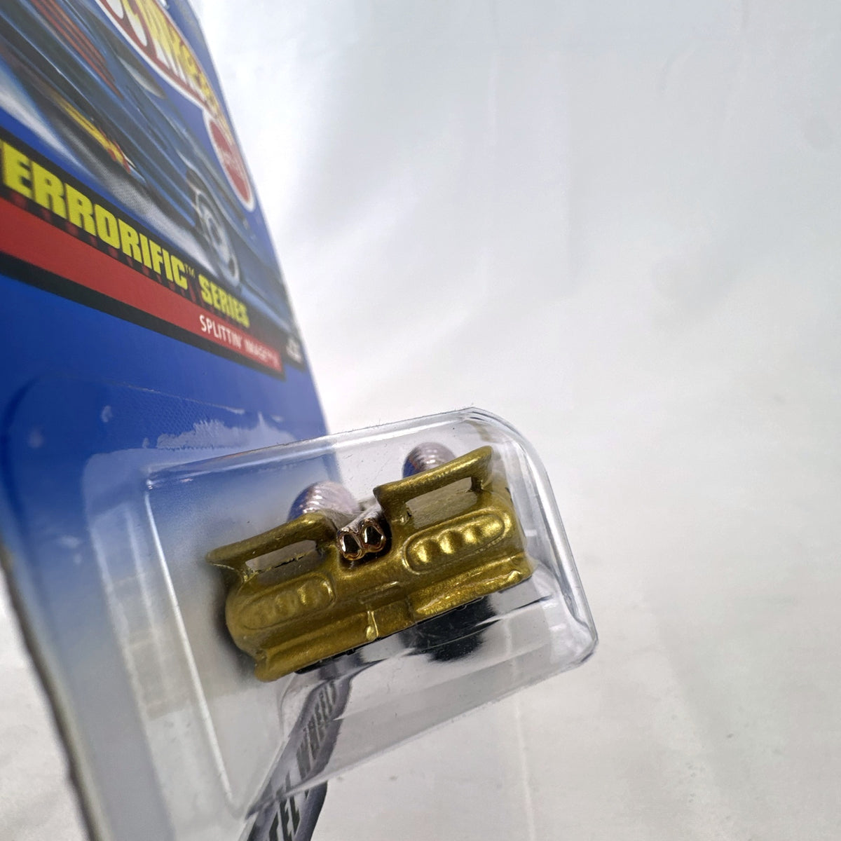 Hot Wheels 1:64 scale Splittin' Image II diecast car in metallic gold sealed on original Terrorific Series blister card