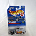 Hot Wheels 1956 Chevy Flashsider 1:64 scale diecast pickup truck in metallic silver on sealed vintage blue card