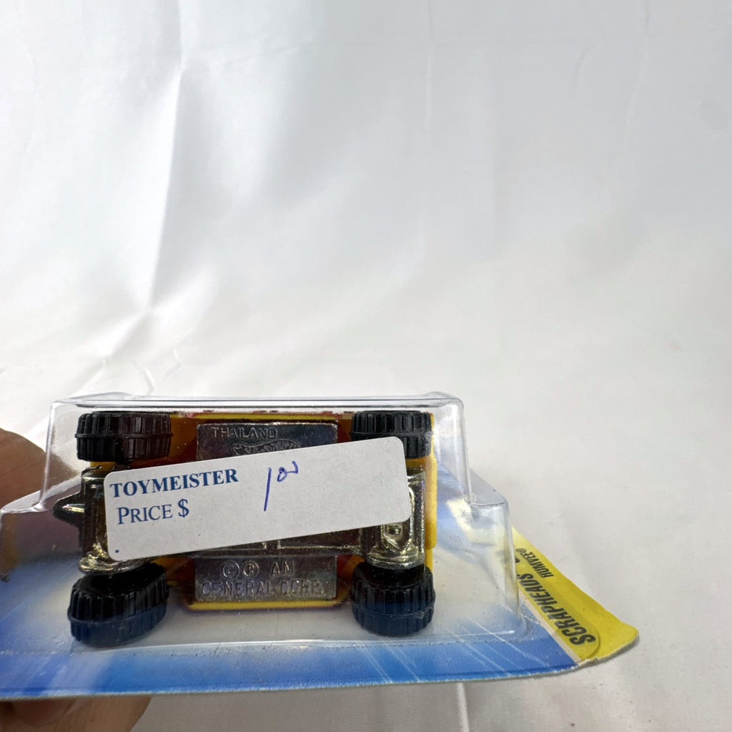 2004 Hot Wheels Scrapheads AM General Humvee 1:64 scale diecast car sealed on card in yellow with leopard print tampos