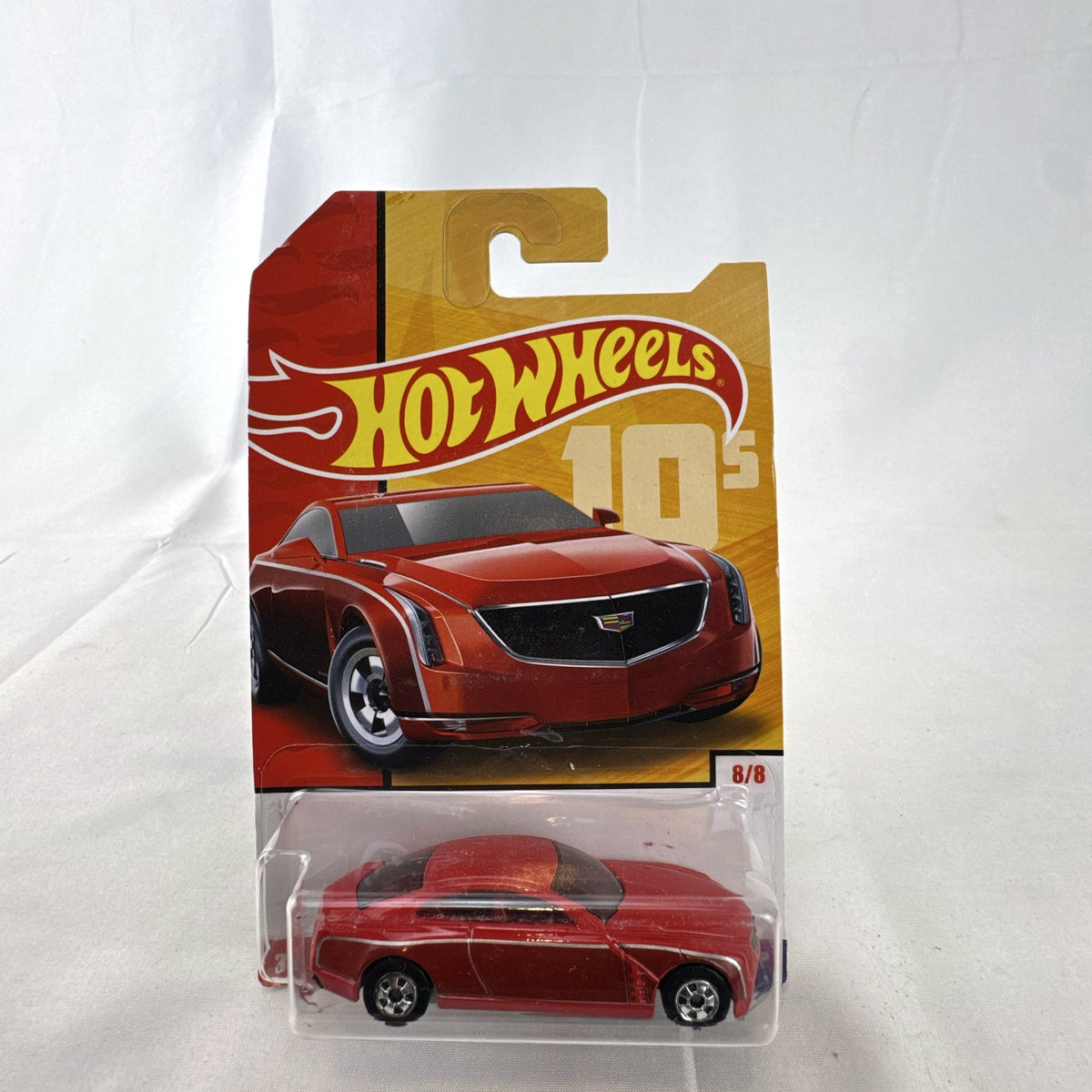 Hot Wheels 2013 Cadillac Elmiraj 1:64 scale diecast concept car in red, factory sealed on blister card.