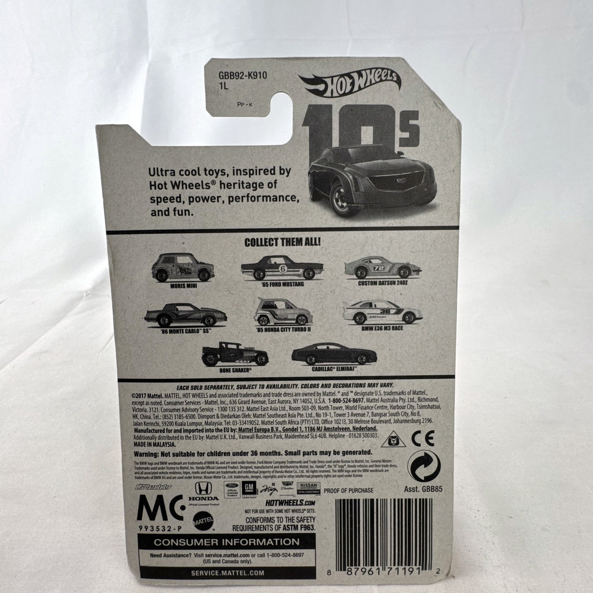 Hot Wheels 2013 Cadillac Elmiraj 1:64 scale diecast concept car in red, factory sealed on blister card.