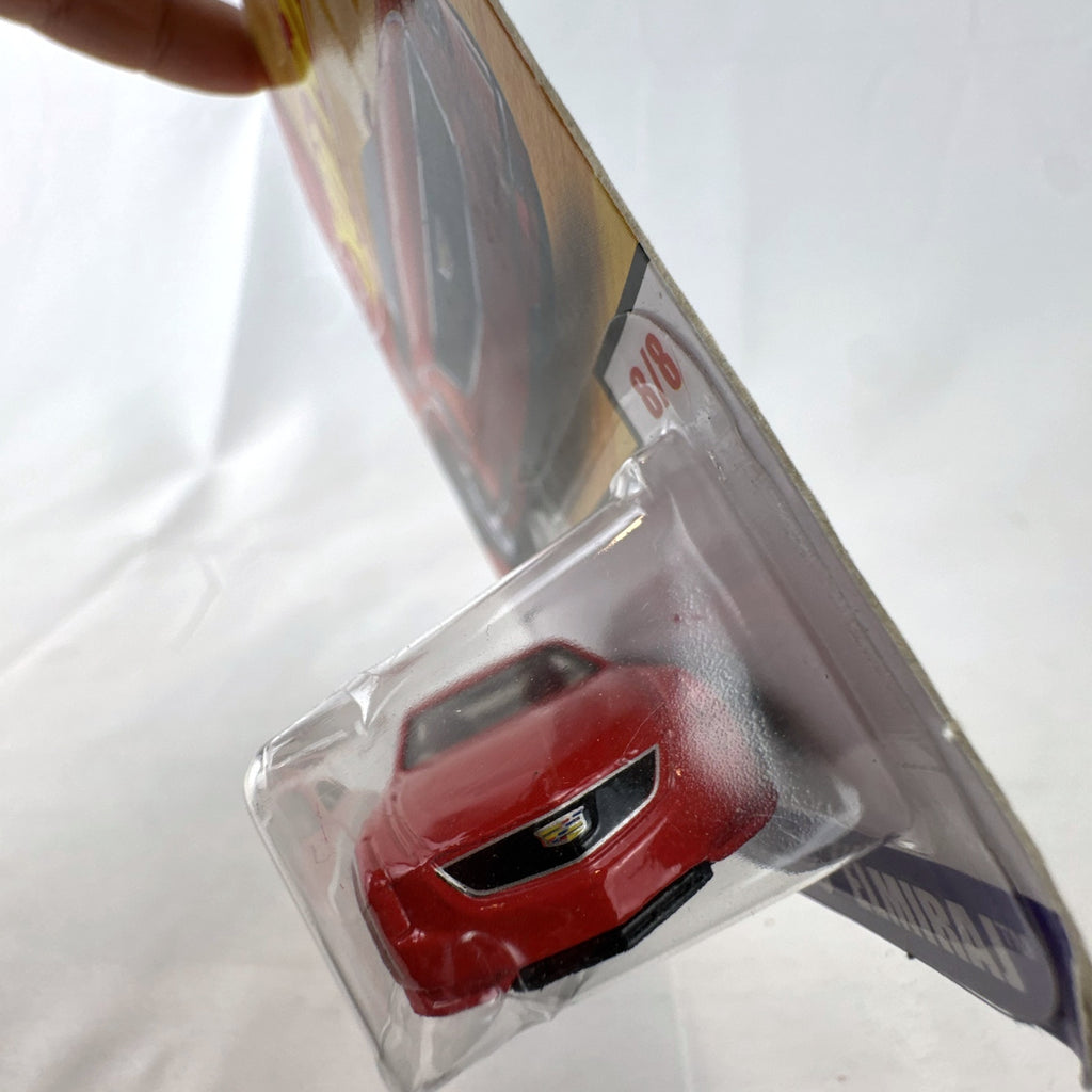 Hot Wheels 2013 Cadillac Elmiraj 1:64 scale diecast concept car in red, factory sealed on blister card.