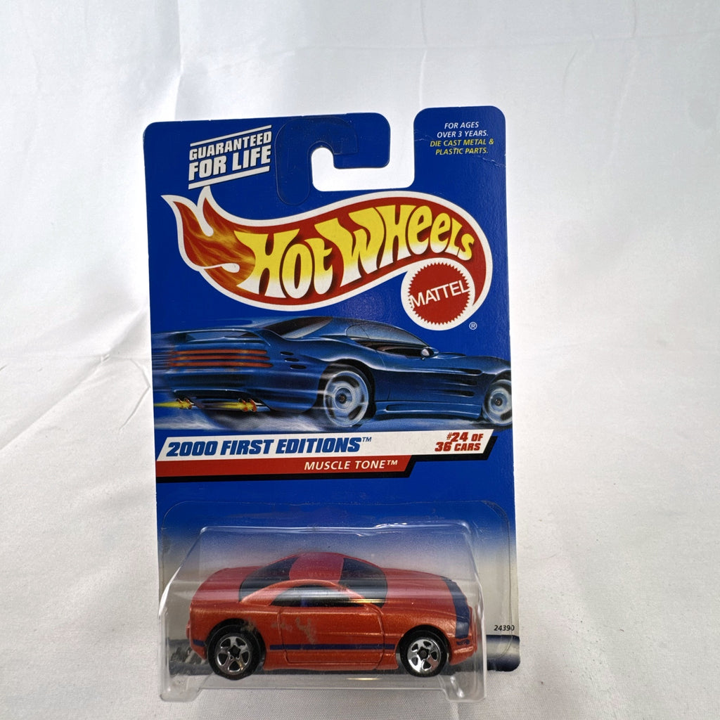 Hot Wheels Muscle Tone diecast car in metallic orange sealed on original 2000 First Editions card.
