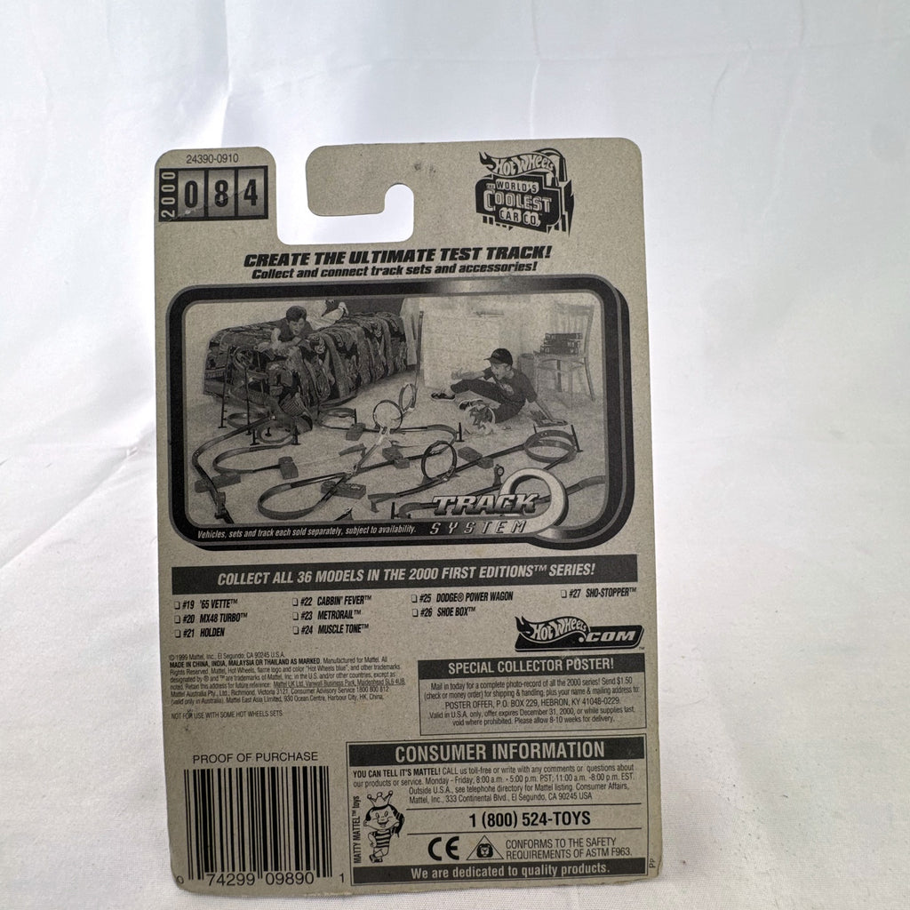 Hot Wheels 2000 First Editions Muscle Tone diecast car in metallic orange on original card