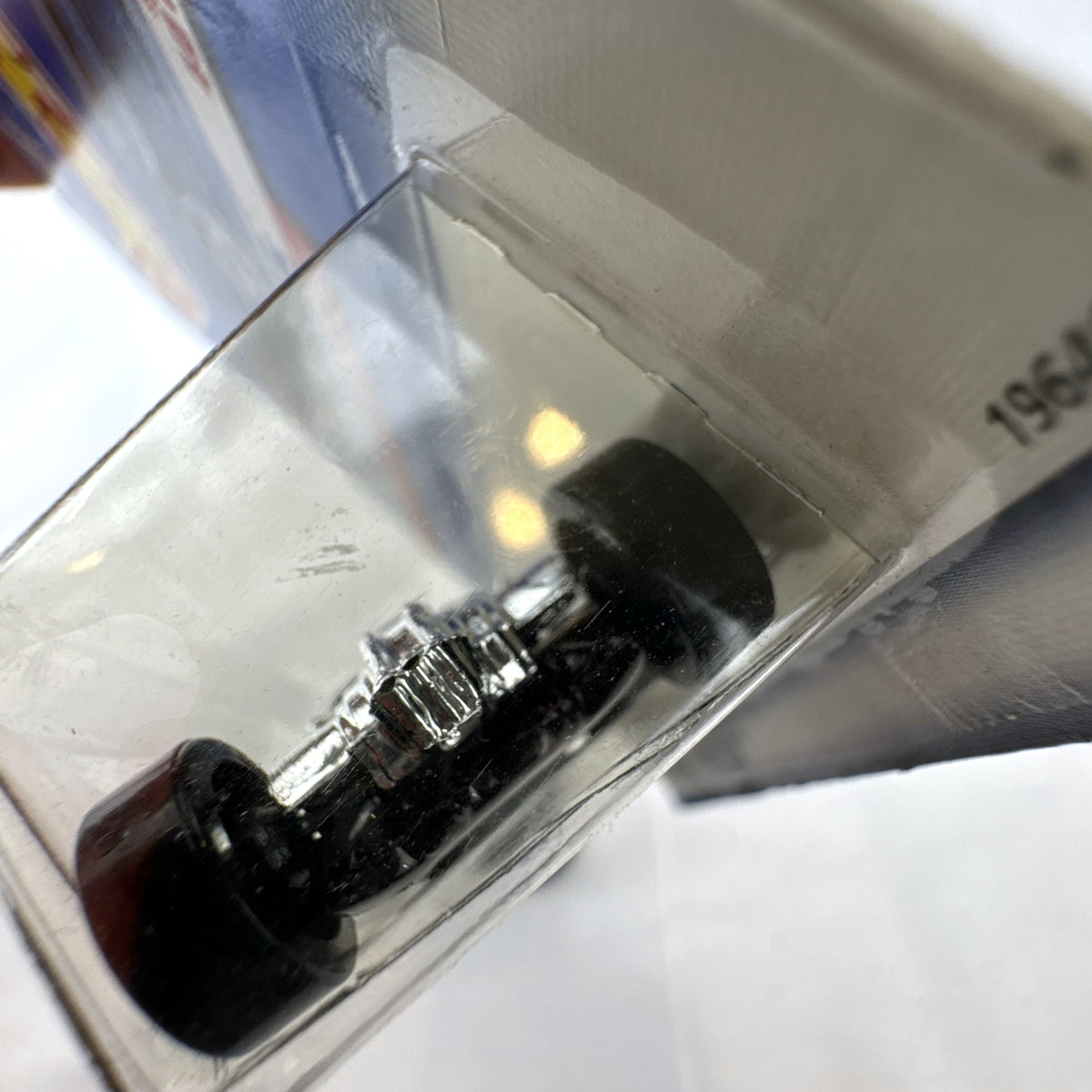 Unopened 1998 Hot Wheels First Editions Sweet 16 II diecast car in dark purple on original card