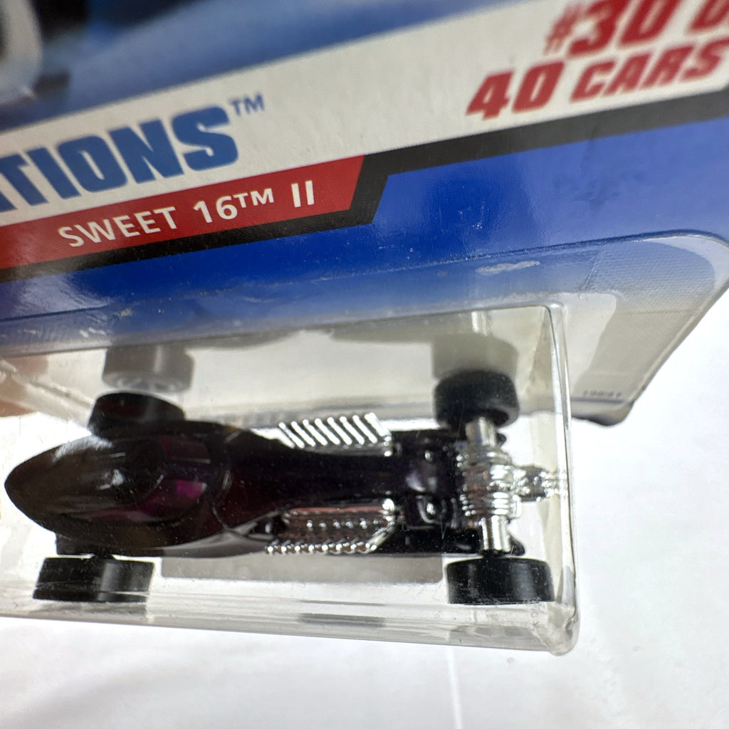 Unopened 1998 Hot Wheels First Editions Sweet 16 II diecast car in dark purple on original card