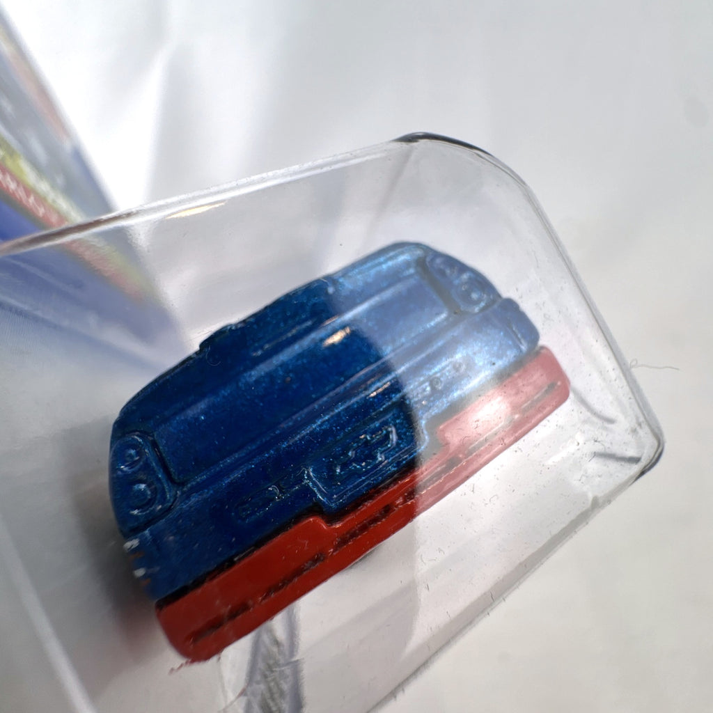 1:64 scale Hot Wheels 2000 Chevy Monte Carlo Concept car in metallic blue Snack Time Series packaging.