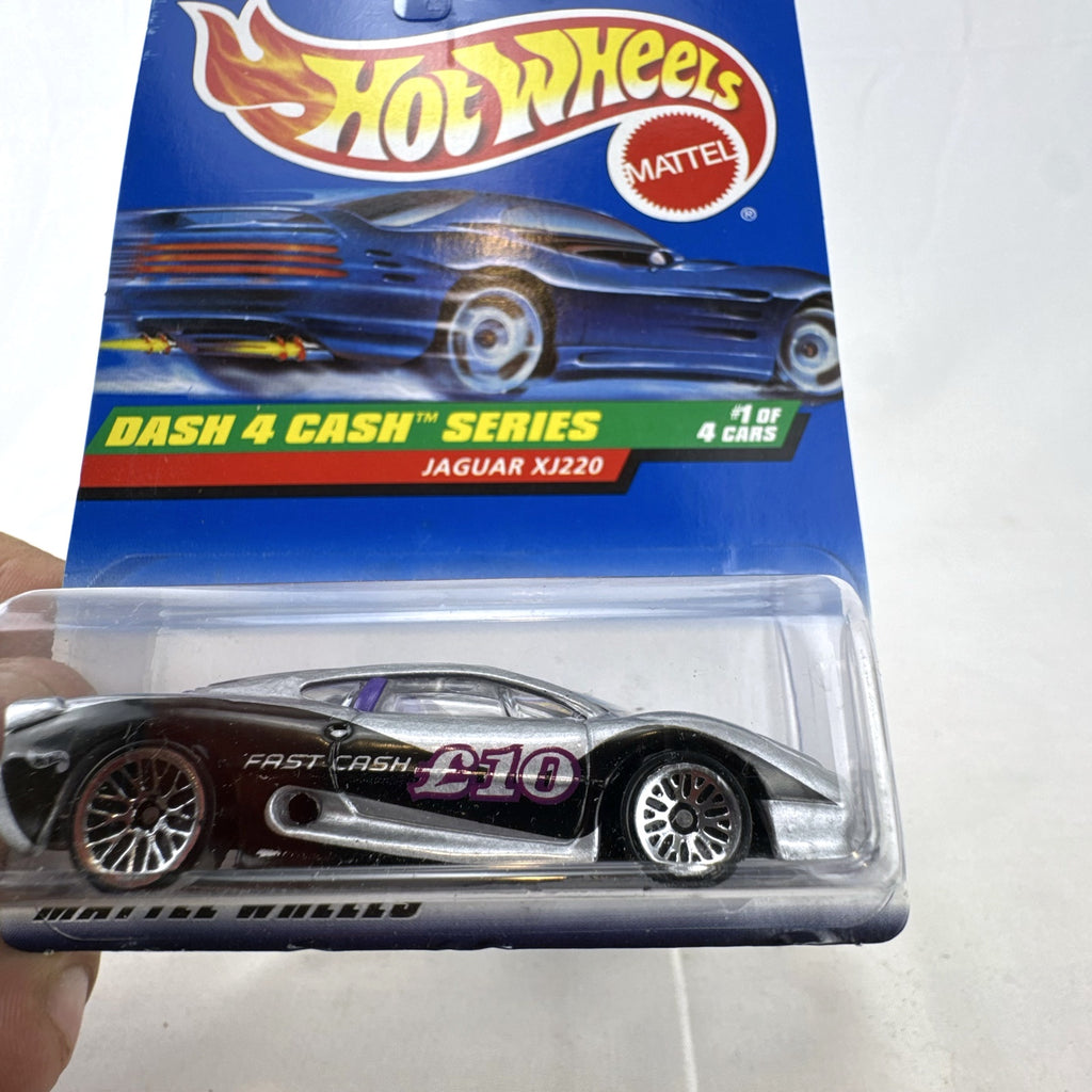 Sealed 1998 Hot Wheels Dash 4 Cash Jaguar XJ220 1:64 scale diecast car in metallic silver