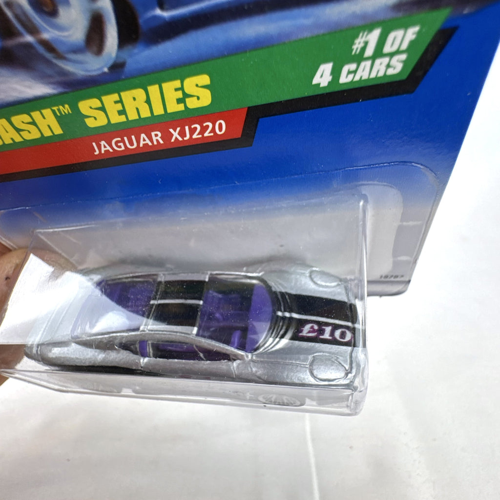 Sealed 1998 Hot Wheels Dash 4 Cash Jaguar XJ220 1:64 scale diecast car in metallic silver