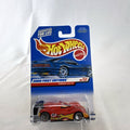 Hot Wheels 2000 First Editions Ferrari 333 SP 1:64 diecast race car in red with yellow flame graphics, sealed on card.