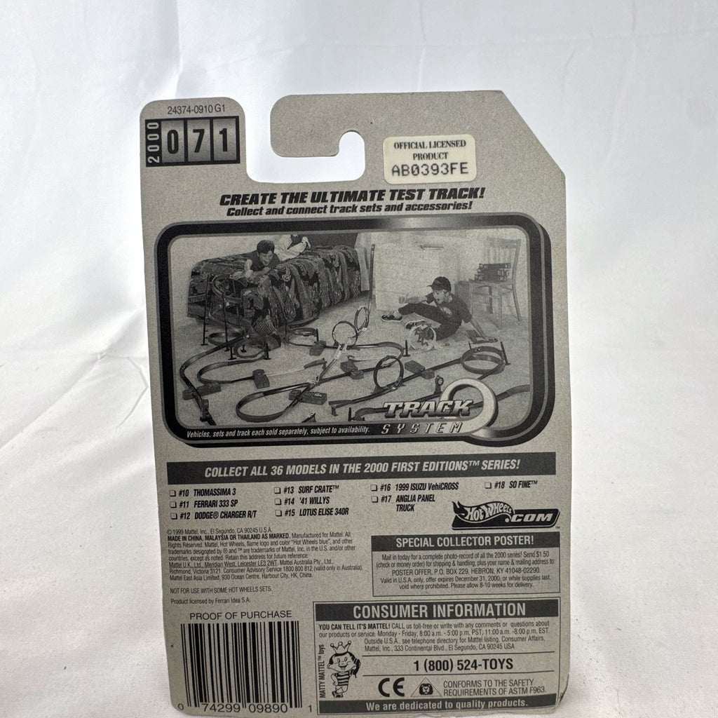 Hot Wheels 2000 First Editions Ferrari 333 SP 1:64 diecast race car in red with yellow flame graphics, sealed on card.