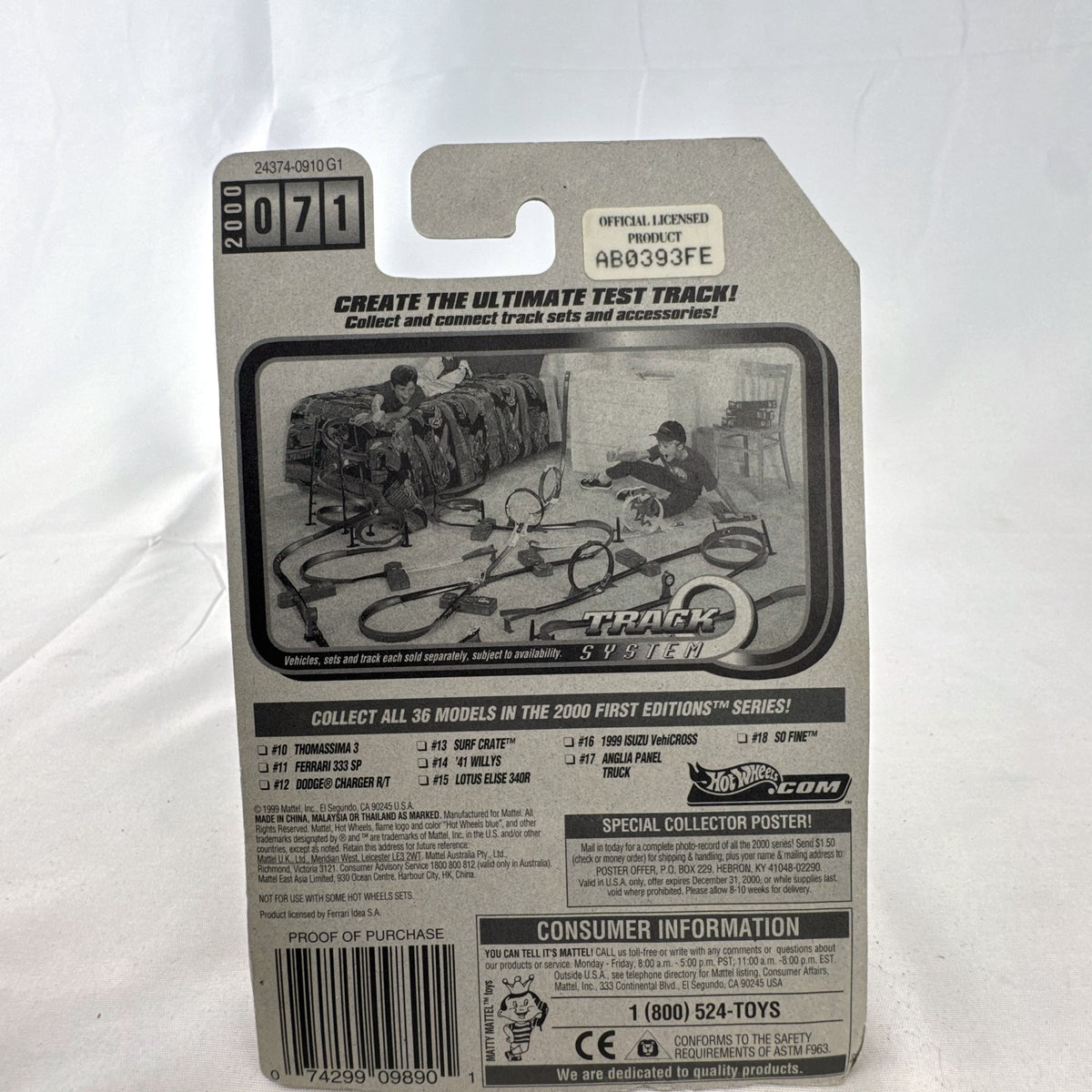 Hot Wheels 2000 First Editions Ferrari 333 SP 1:64 diecast race car in red with yellow flame graphics, sealed on card.