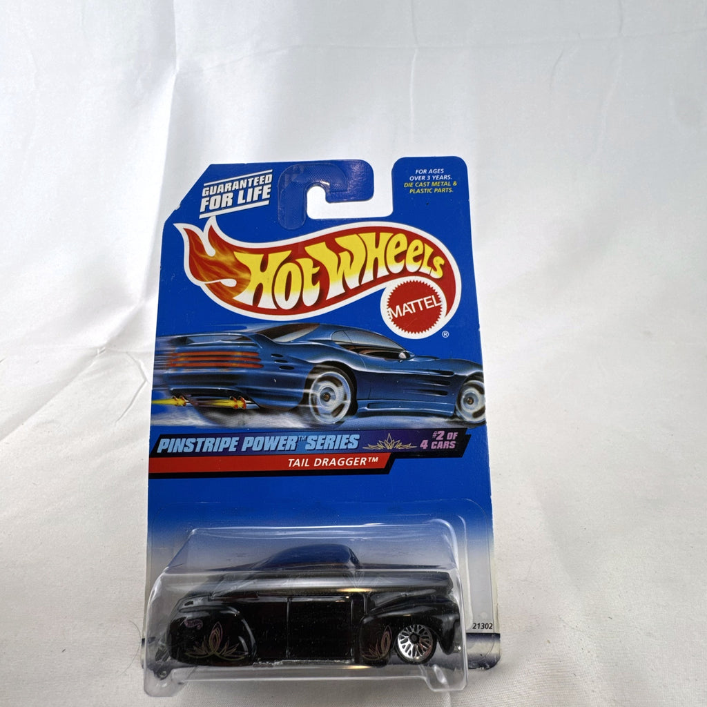Hot Wheels Tail Dragger 1:64 scale diecast car in gloss black on original Pinstripe Power blister card