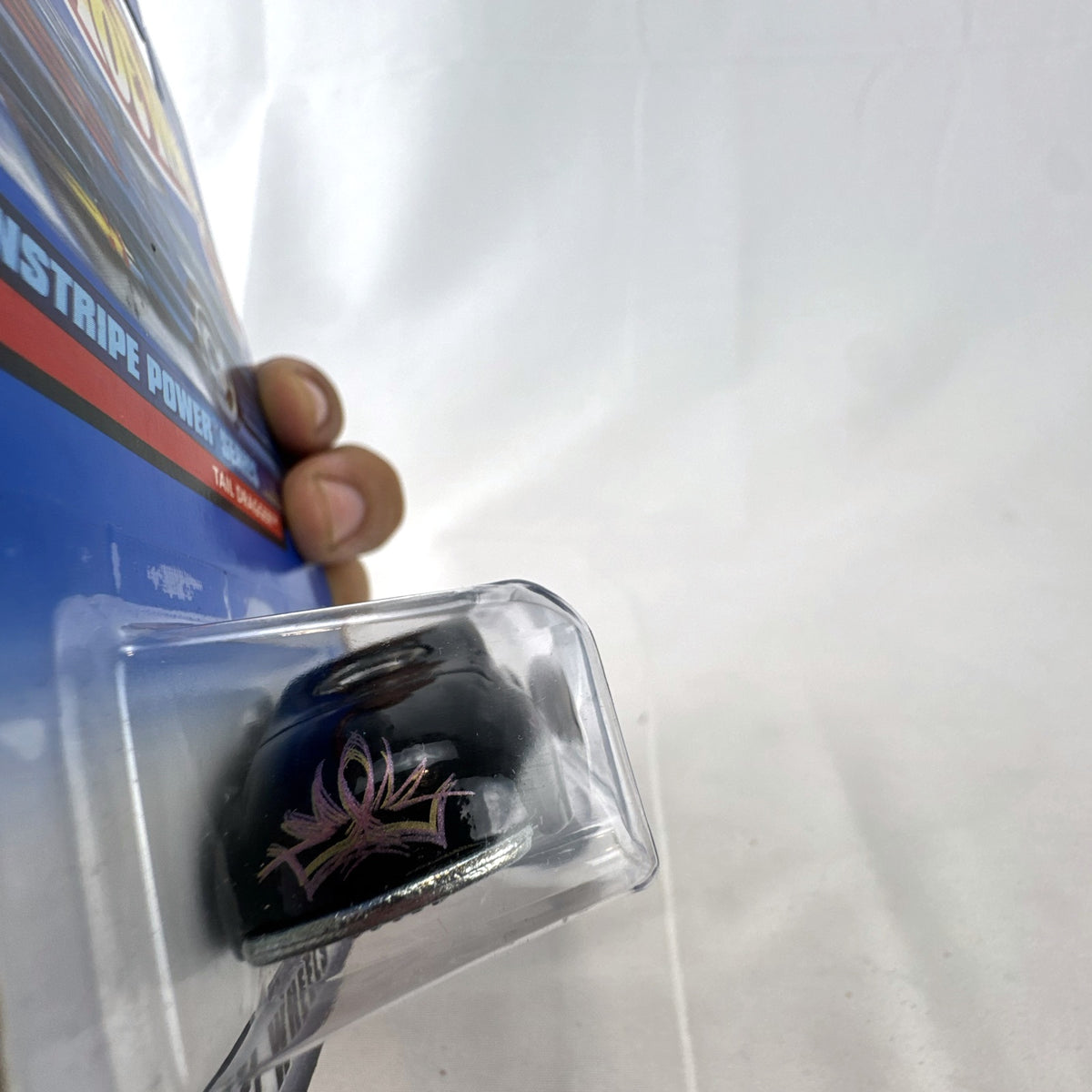 Hot Wheels Tail Dragger 1:64 scale diecast car in gloss black on original Pinstripe Power blister card