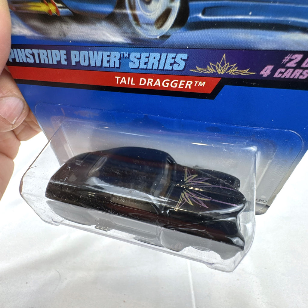 Hot Wheels Tail Dragger 1:64 scale diecast car in gloss black on original Pinstripe Power blister card