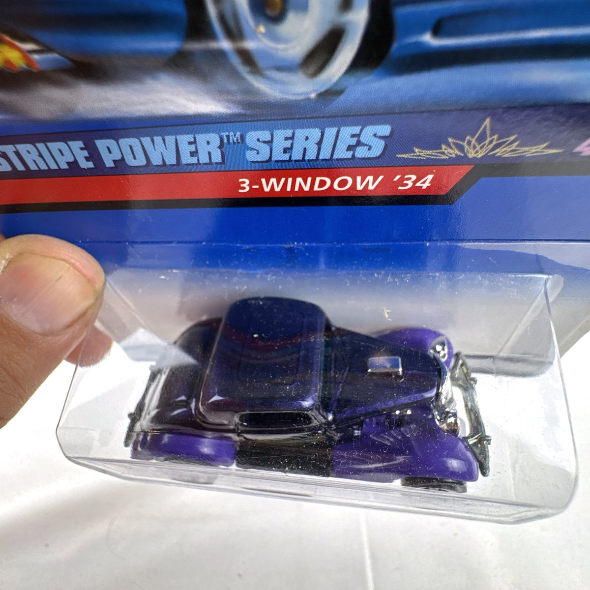 Hot Wheels 1998 Pinstripe Power 1934 Ford 3-Window Coupe diecast car in purple packaging
