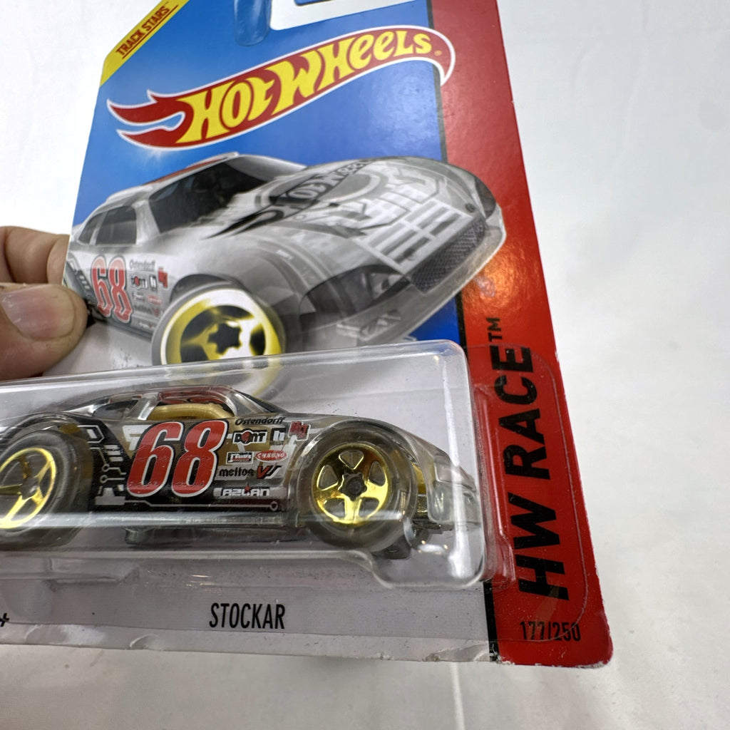 Hot Wheels Stockar 1:64 scale diecast car with clear body and gold chrome wheels in original unopened packaging