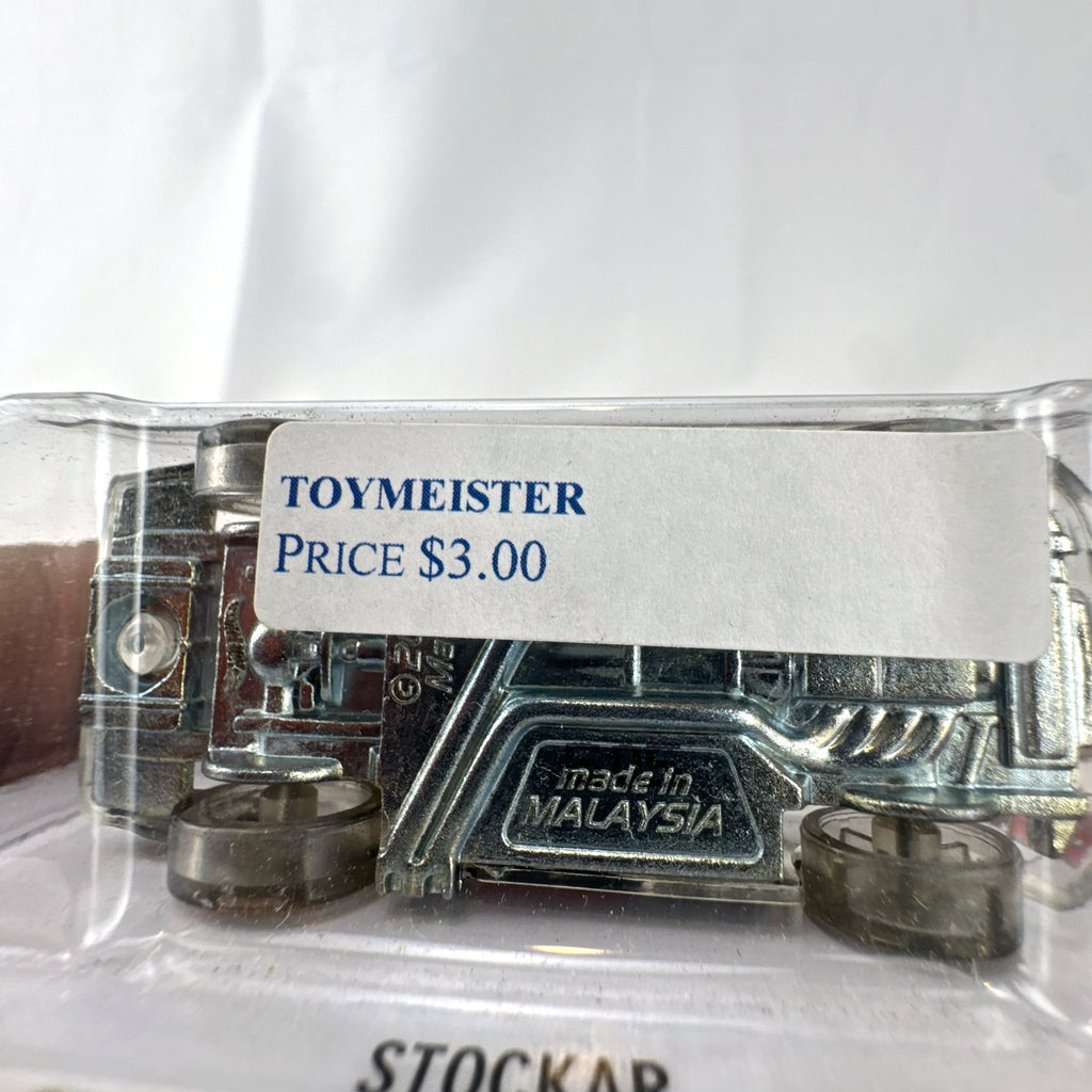 Hot Wheels Stockar 1:64 scale diecast car with clear body and gold chrome wheels in original unopened packaging