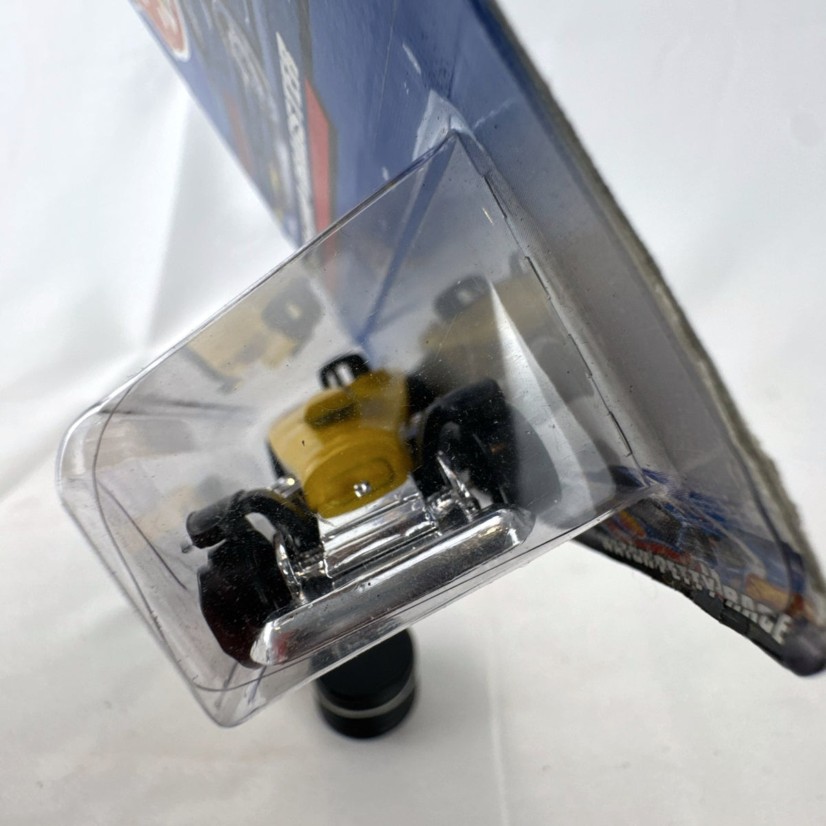 Hot Wheels 2000 Super Comp Dragster 1:64 scale diecast car in yellow with black flames on original blister card