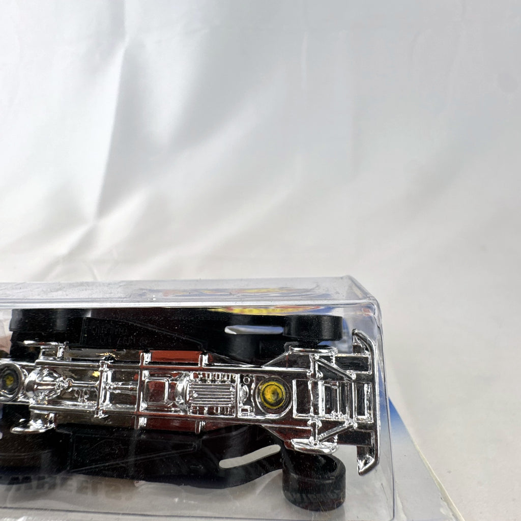 Hot Wheels 2000 Super Comp Dragster 1:64 scale diecast car in yellow with black flames sealed on card