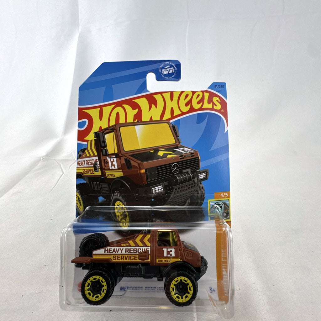 Hot Wheels 1:64 scale Mercedes-Benz Unimog 1300 diecast rescue truck in brown, sealed on card