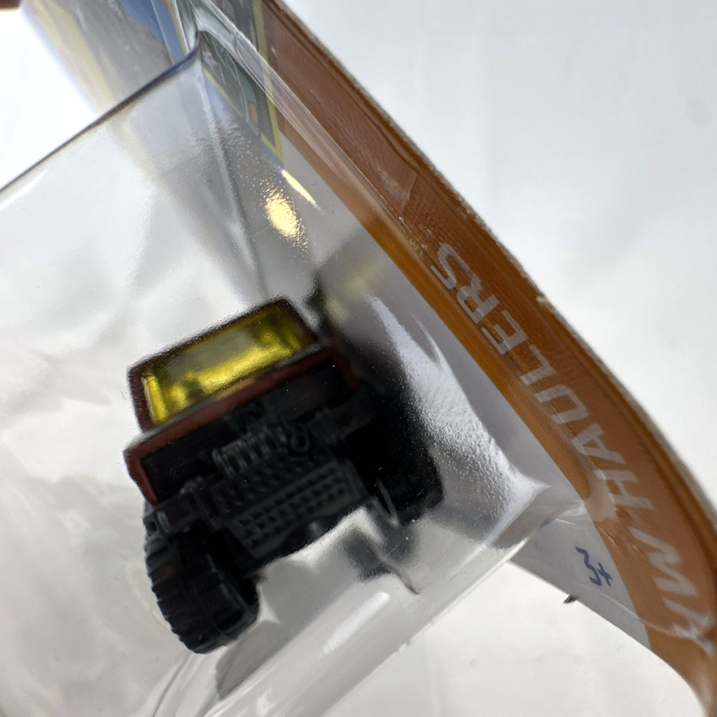 Hot Wheels 1:64 scale Mercedes-Benz Unimog 1300 diecast rescue truck in brown, sealed on card