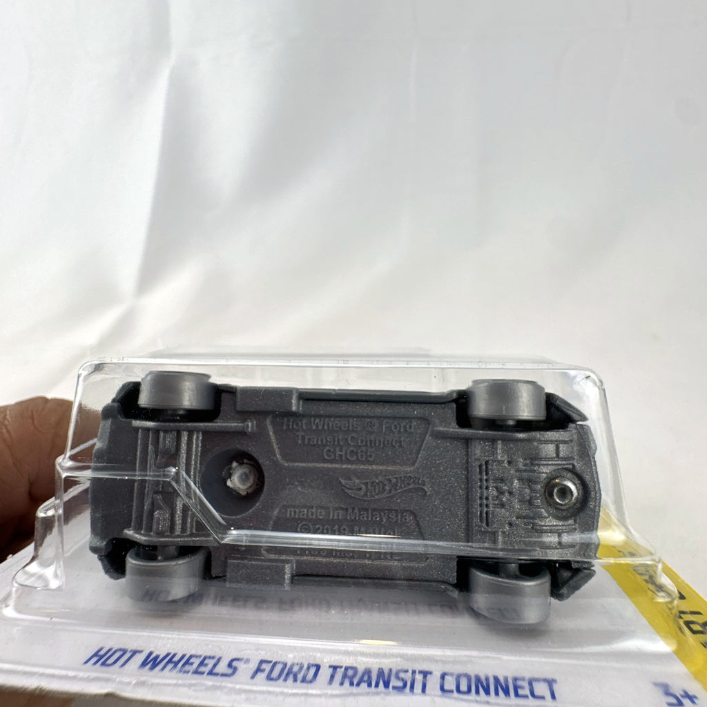 Hot Wheels Ford Transit Connect HW Art Cars 1:64 scale diecast van in white with tiger graphics