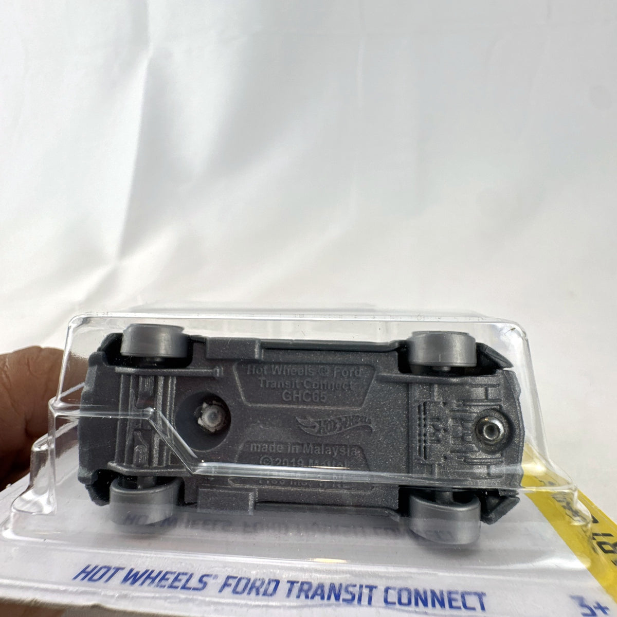Hot Wheels Ford Transit Connect HW Art Cars 1:64 scale diecast van in white with tiger graphics