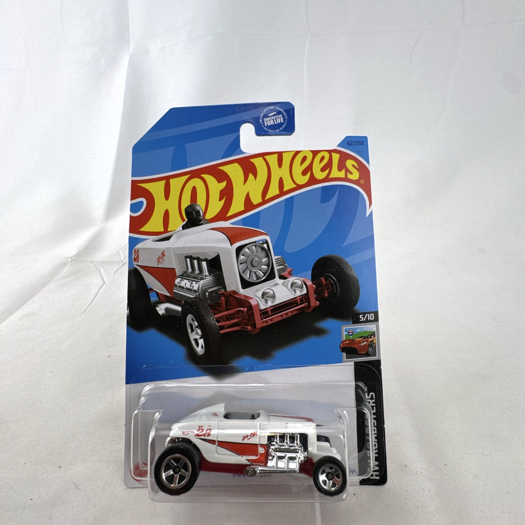 Unopened Hot Wheels Max Steel diecast car in white with red So-Cal Speed Shop graphics in 1:64 scale packaging.